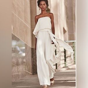 NWT Elegant White slash off shoulder Strapless Jumpsuit with belt strap XS